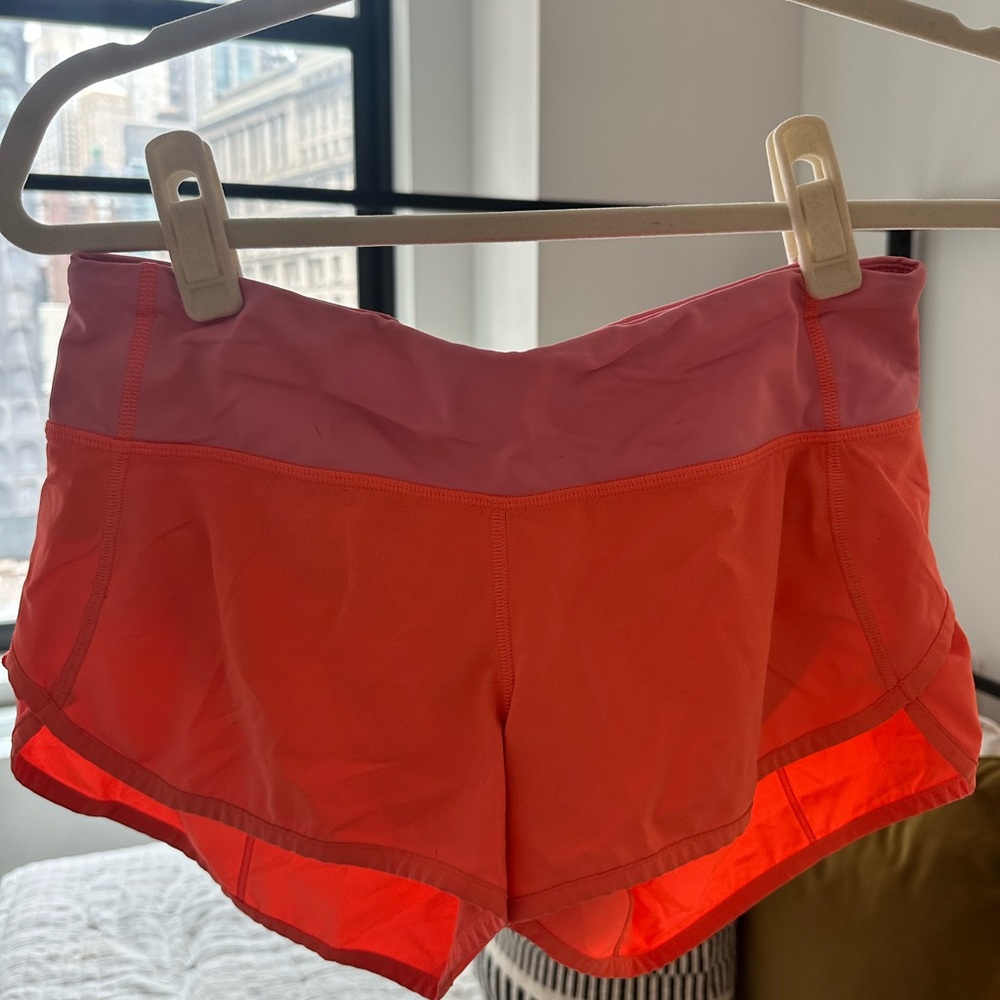 Lulu lemon neon orange running shorts (Size 4)
